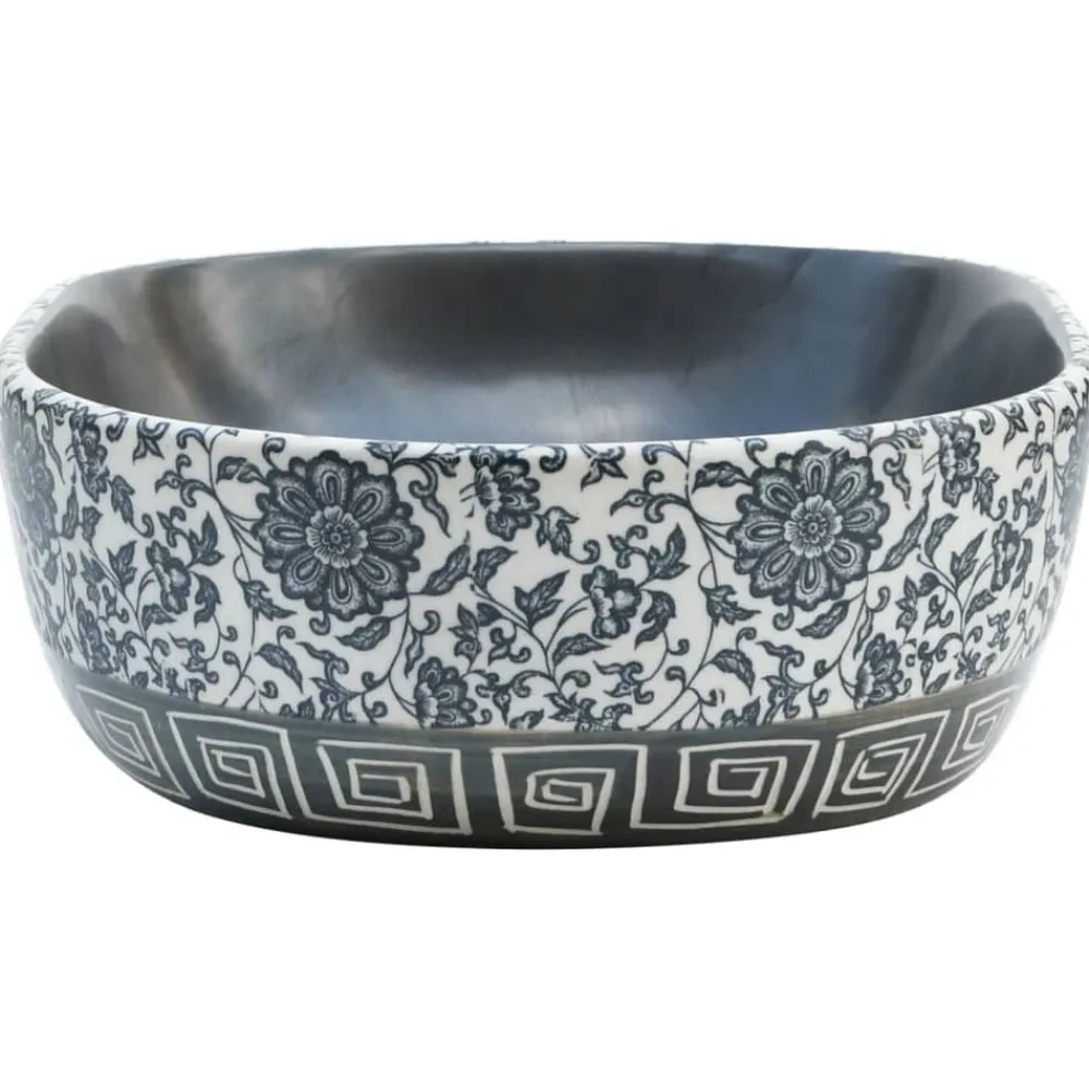 vidaXL Lavabo sobre encimera ovalado cerámica 47x33x13 cm Negro y azul