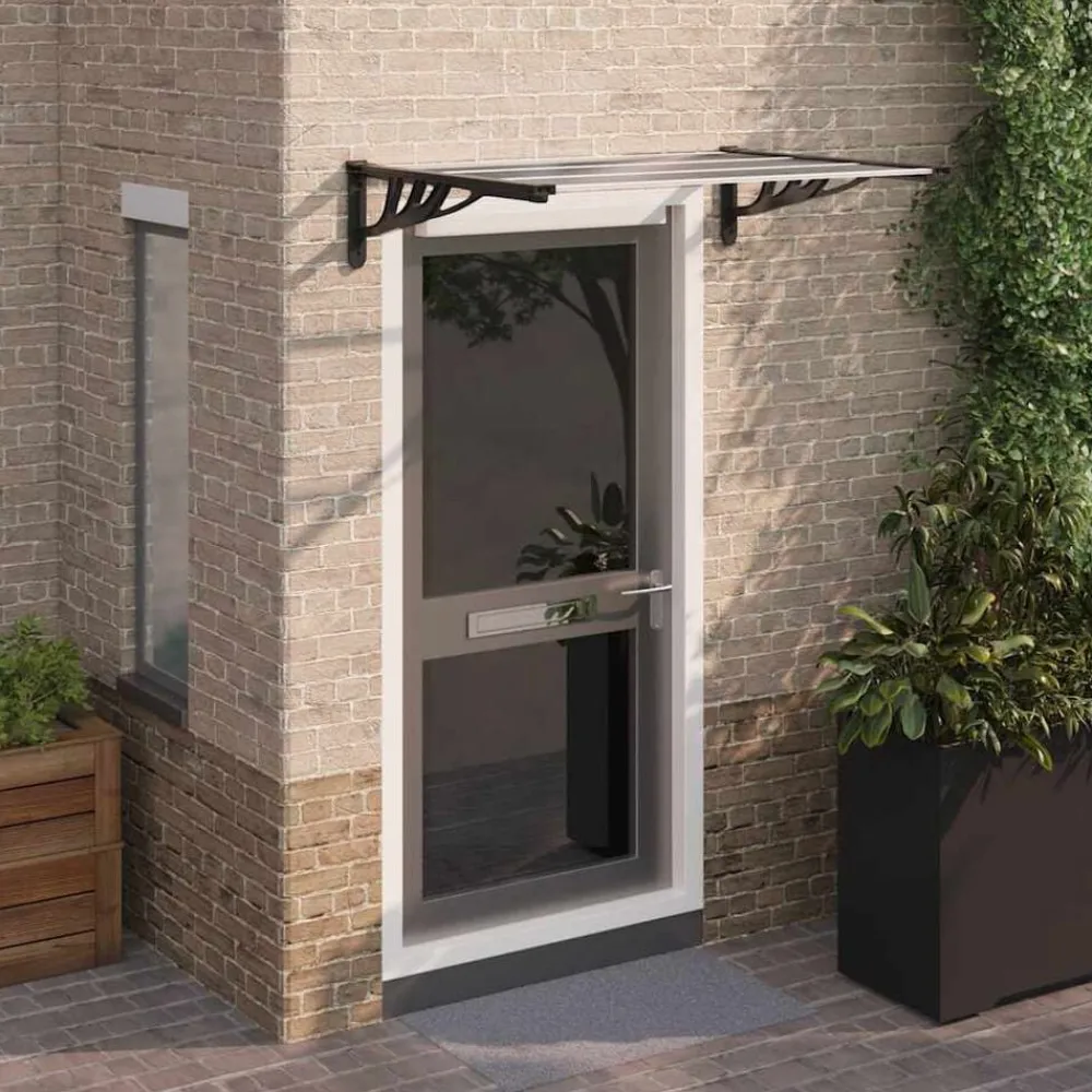 vidaXL Jardín-Marquesina puerta policarbonato negro y transparente 122x90 cm