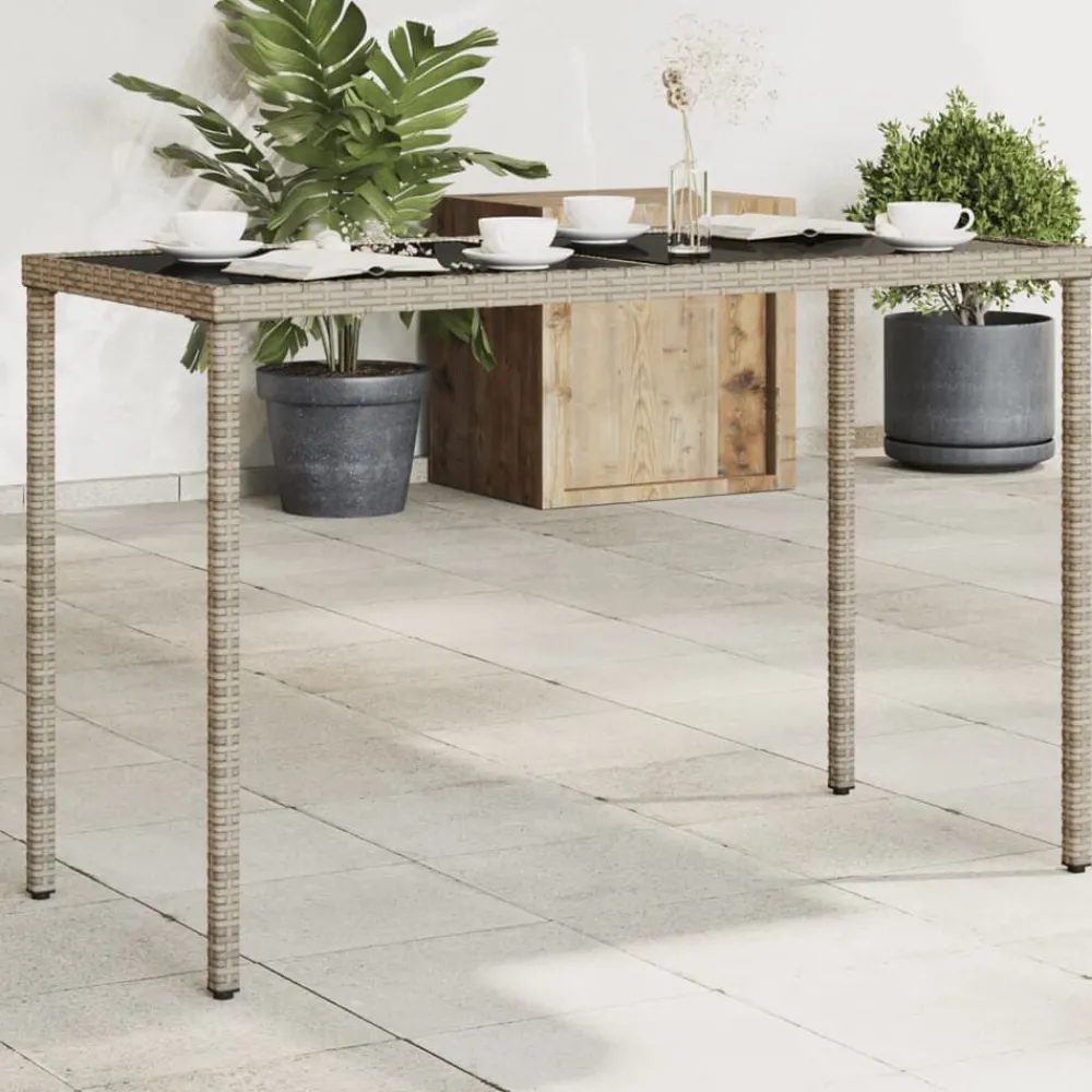vidaXL Mesa de jardín superficie de vidrio ratán PE 115x54x74 cm Gris Online