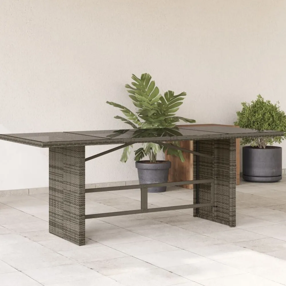 vidaXL Mesa de jardín superficie de vidrio ratán PE 190x80x75 cm Gris