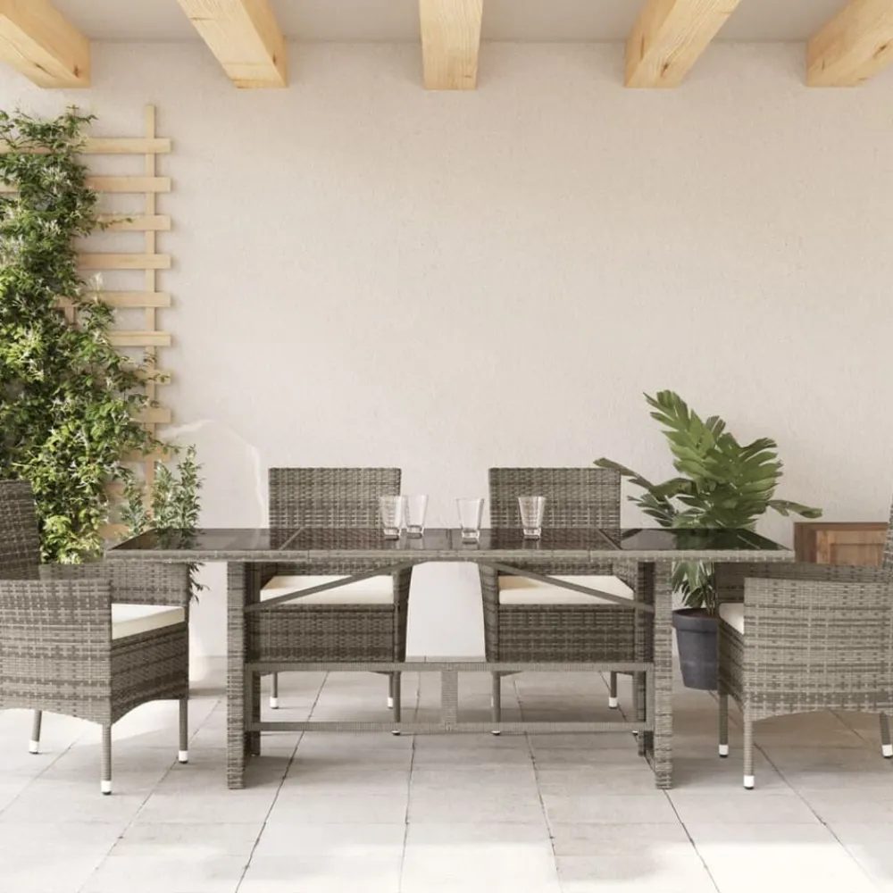 vidaXL Mesa de jardín superficie de vidrio ratán PE 190x80x75 cm Gris